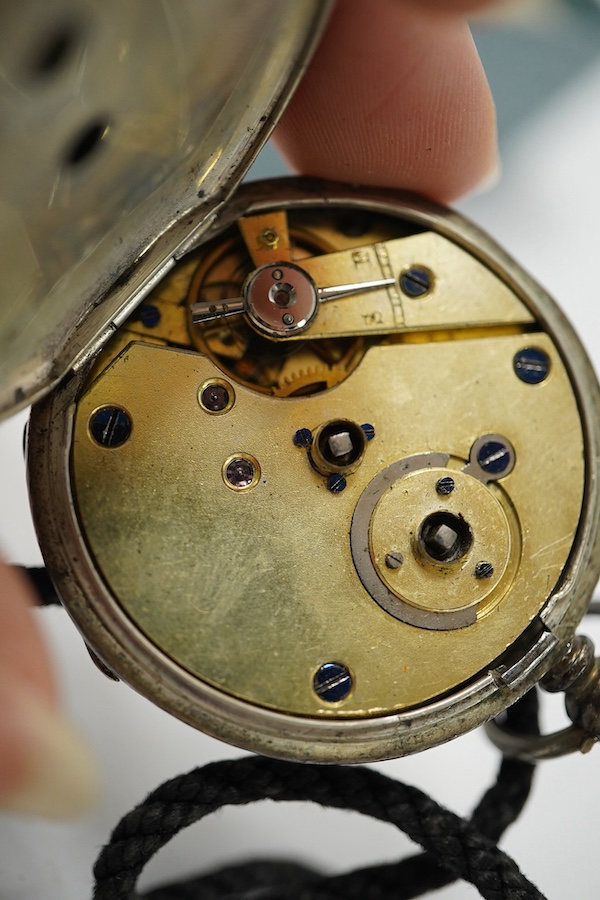 A George V Waltham silver open faced key wind pocket watch (a.f.), a 935 white metal open faced pocket watch and an 800 white metal fob watch. Condition - poor